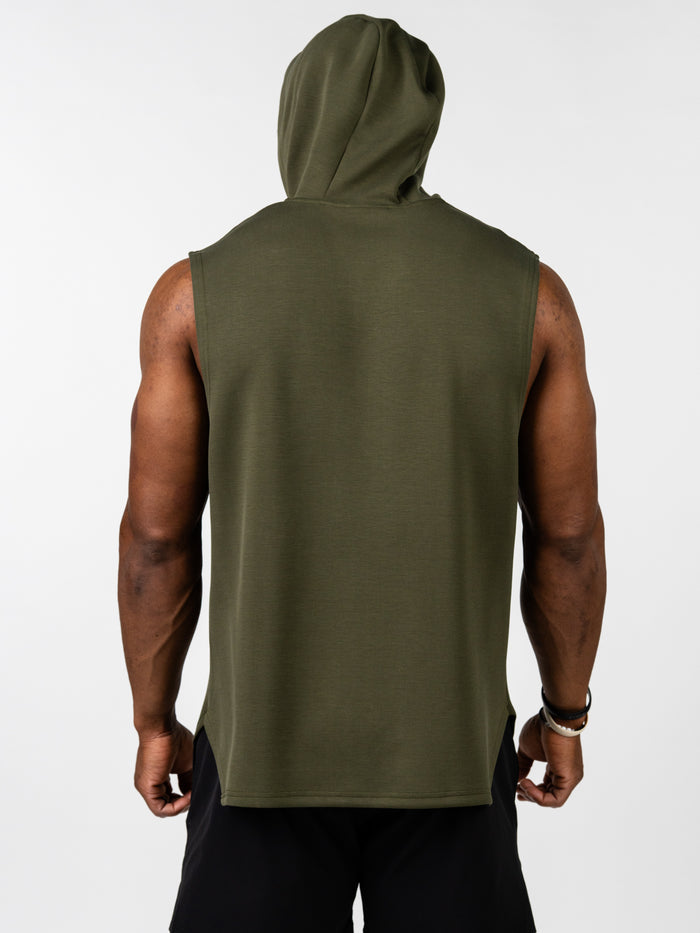 Rear view of a muscular man wearing an olive green Essential Sleeveless Hoodie with a hood, paired with black shorts, showcasing a sleeveless design ideal for unrestricted movement during workouts.