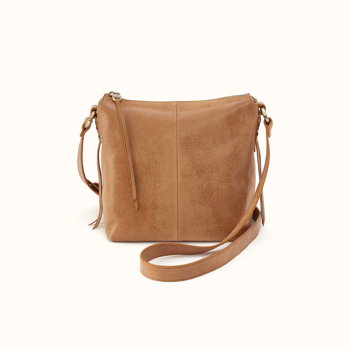 Brown leather handbag with a strap on a white background- FOL
