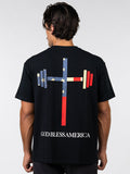 Person wearing a black t-shirt with a graphic design on the back and 'God Bless America' text.