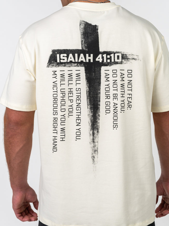Rear view of person wearing an Isaiah 41:10 Premium Oversized Tee featuring a large black cross design with scripture text offering encouragement and faith-based strength in Christian gym clothing style.