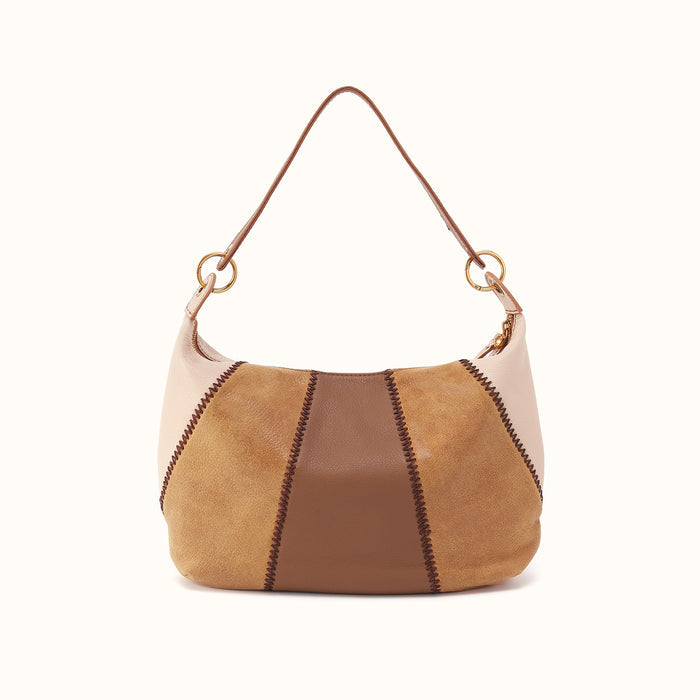 Two-tone handbag with beige and brown colors on a white background