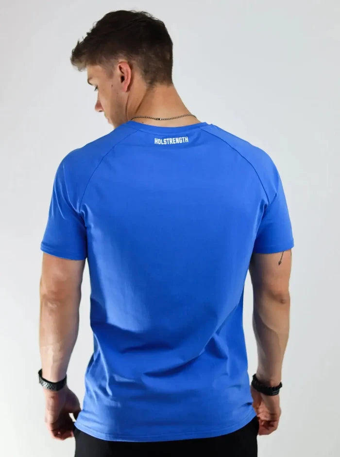 Man wearing a Dark Blue t-shirt with a white logo, back view