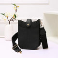 The Zoey Vegan Leather Canvas Strap Bag
